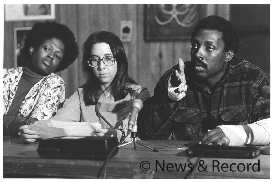 Joyce Johnson, Sally Bermanzohn and Nelson Johnson at a press conference on Nov. 4, 1979.