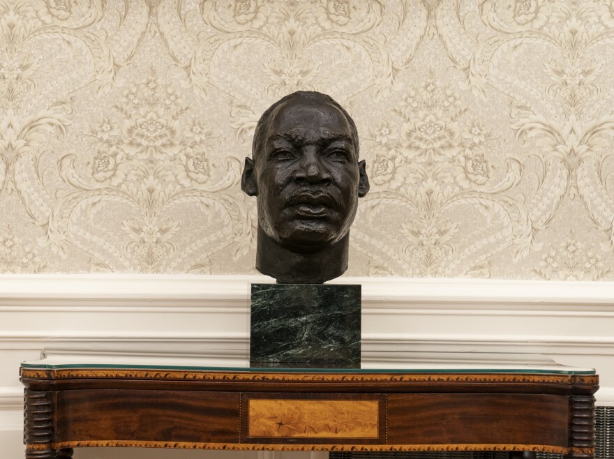 A bust of the Rev. Dr. Martin Luther King Jr. in the Oval Office. Former President Trump also displayed a bust of King.