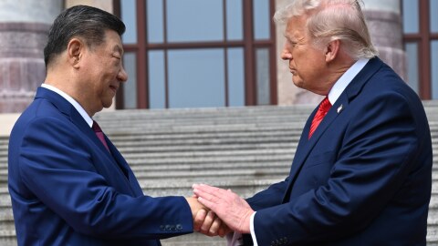 Chinese President Xi Jinping, left, shakes hands with U.S. President Donald Trump at the Great Hall of the People in Beijing, Thursday, May 14, 2026. (Kenny Holston/Pool Photo via AP)