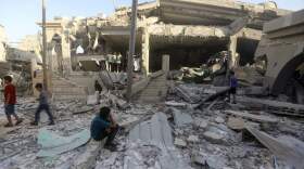 Palestinians inspect the damage of a destroyed mosque following an Israeli airstrike in Khan Younis refugee camp, southern Gaza Strip, Wednesday. (Mohammed Dahman/AP)