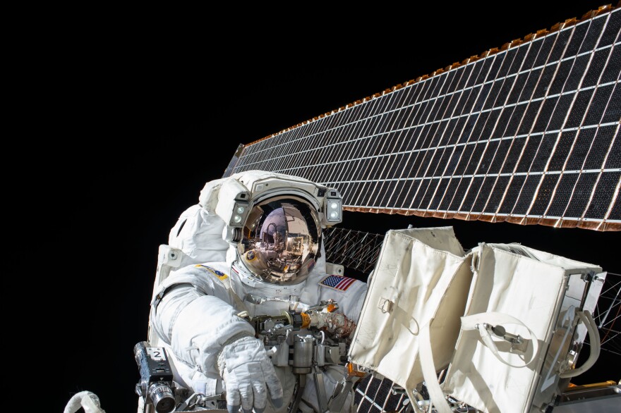 NASA astronaut Scott Kelly works outside the International Space Station during a spacewalk last year.