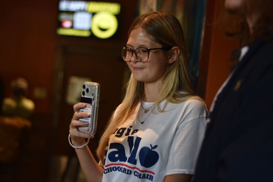 A young Gallo supporter records Angie Gallo as election results roll in.