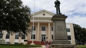 The 20-foot Confederate monument on Putnam County's courthouse lawn bears an inscription on the side: “The principles for which they fought will live eternally.” (Katie Hyson/WUFT News)