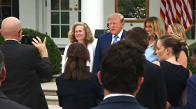 Pamela Whitten next to Donald and Melania Trump at a White House event