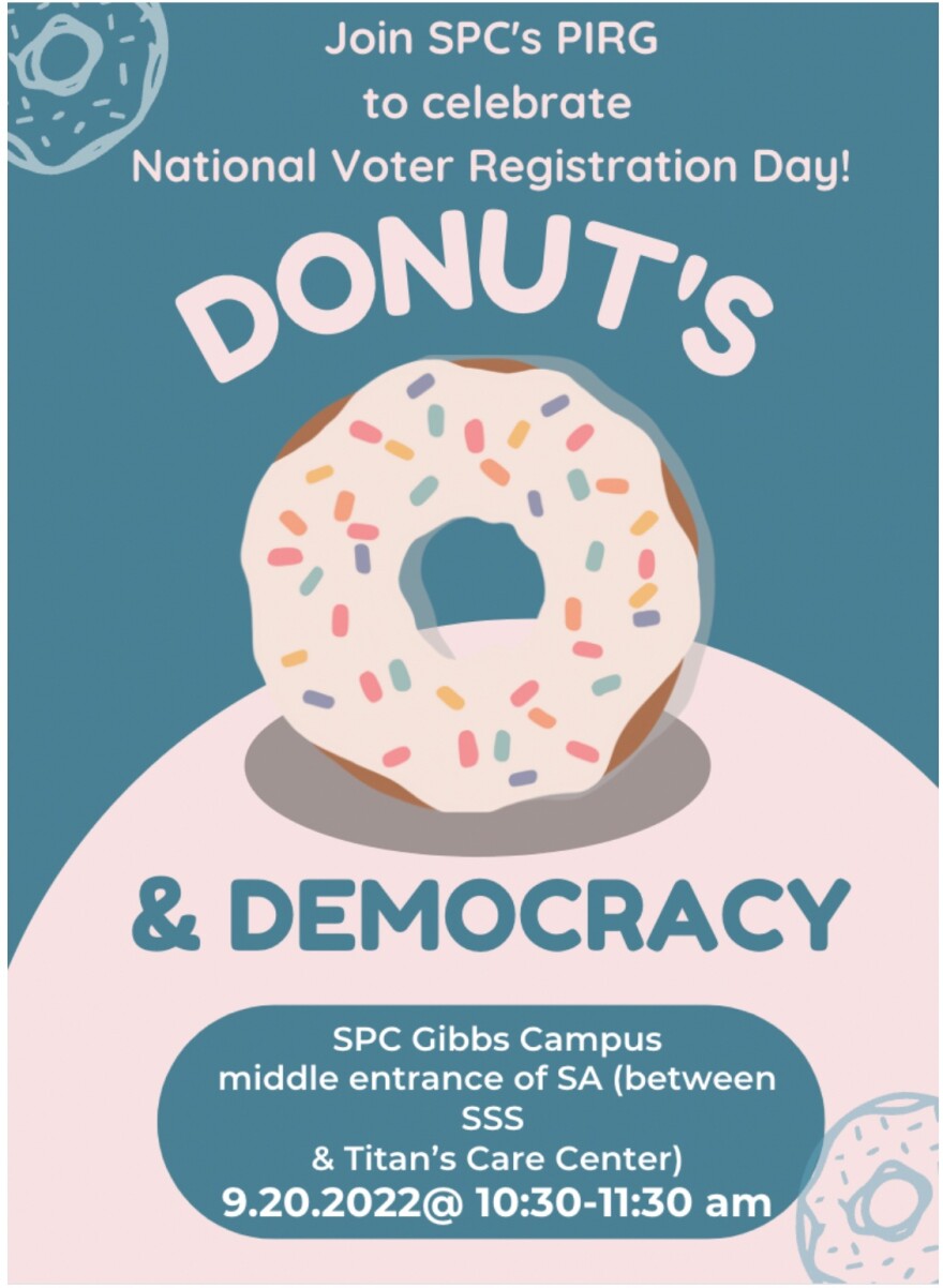 A sign with a donut on it that is encouraging students to attend a voting event 