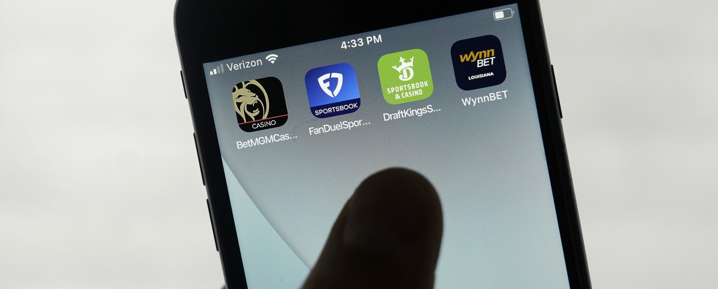 FanDuel, DraftKings and other online gambling apps are displayed on a phone in San Francisco, Monday, Sept. 26, 2022.