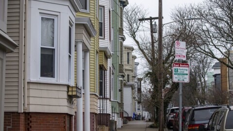 Triple- and double-decker apartments in McCormick Square in East Boston. (Jesse Costa/WBUR)