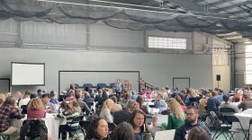 Educators, admins and students participate in a workshop at the first annual Green Schools Symposium at Thomas College in Waterville. November 7, 2025.