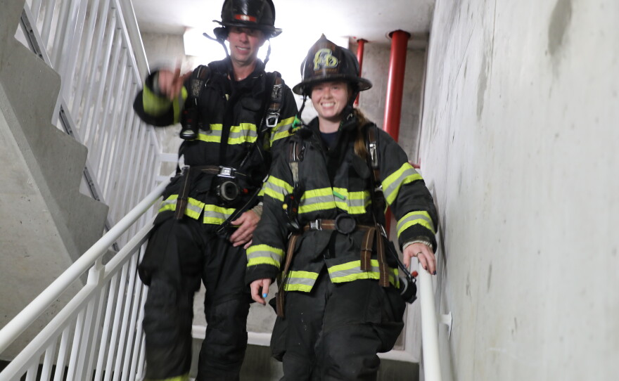 Firefighters participate in the 9-11 stair climb on Navarre Beach.