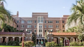 Florida State University students leave Landis Hall on the campus of Florida State University in Tallahassee, Fla., Friday April 30, 2015. (AP Photo/Mark Wallheiser)