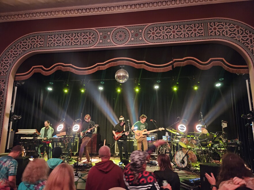 Squeaky Feet onstage at Lark Hall in Albany, New York, on October 25, 2025. From left to right: Brian Keller, Colin Shore, Greg King, Jimmy Finnegan, and Kevin D