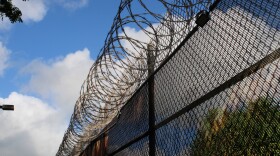 FILE - Barbed wire at the Women's Community Correctional Center in Kailua on Oʻahu. (Oct. 25, 2022)