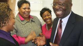 James Guseh with NCCU students Desiree Lewis, Timeika White and Kaia Clarke