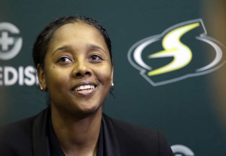 Noelle Quinn speaks with media members at the basketball team's media day May 13, 2019, in Seattle. 