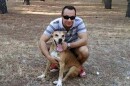 The dog Excalibur belongs to Teresa Ramos, the Ebola-afflicted nurse in Spain. Here, the pet poses with her husband, Javier Limon.