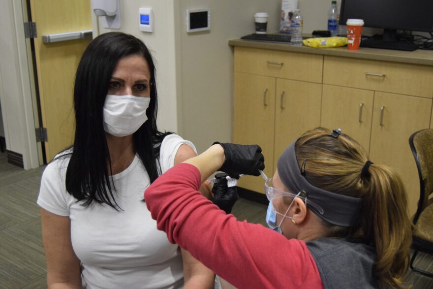 A health care provider administers the COVID-19 vaccine during a vaccination clinic at St. Luke's. (Courtesy of St. Luke's Health System)