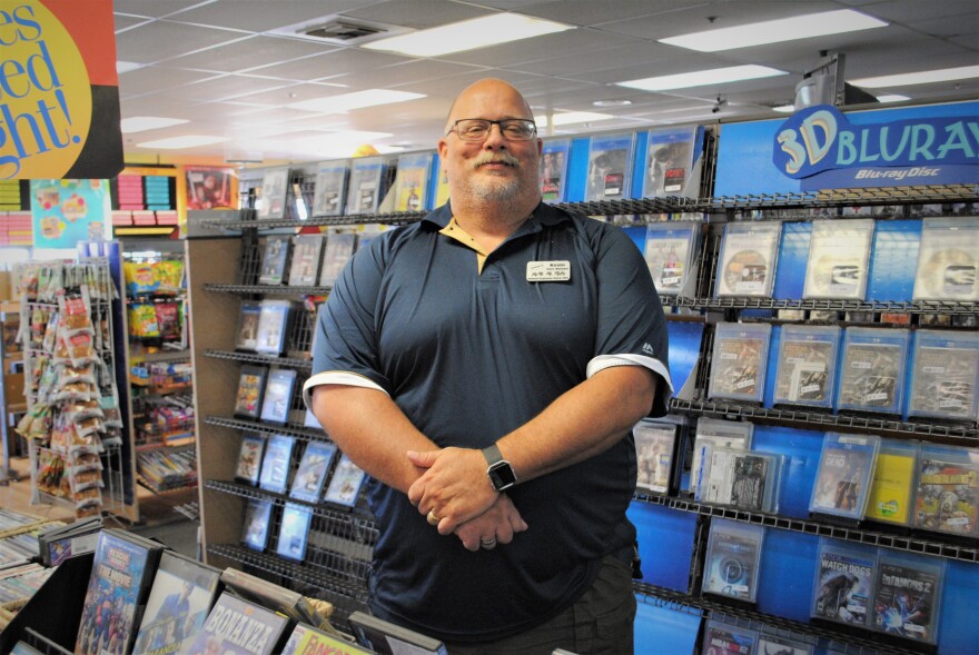 Kevin Daymude is the manager for the remaining Blockbusters in Alaska. (Emily Russell/Alaska Public Media)