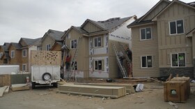 Beige condo units under construction in Boise.