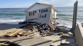 This image released by the National Park Service, shows a collapsed beachfront home along Ocean Drive in Rodanthe, N.C., on Wednesday, Feb. 9, 2022. (National Park Service via AP)