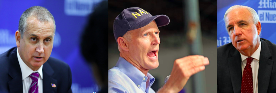 Miami Congressman Mario Diaz-Balart (left), Florida Senator Rick Scott (center) and Miami Congressman Carlos Gimenez