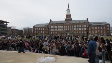 A crowd of University of Cincinnati students and faculty rally on campus against the removal of university DEI programs.