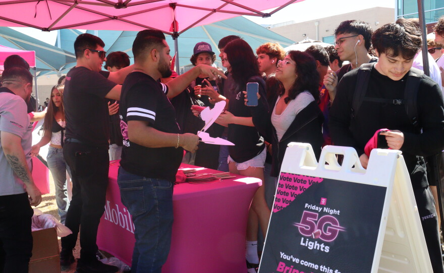 After voting for their school, students received T-Mobile swag.