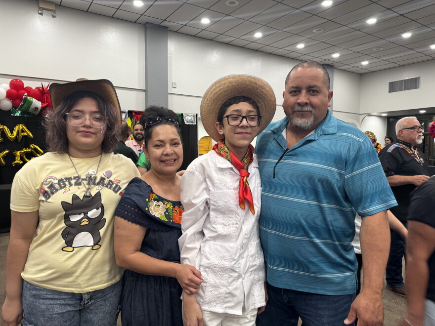 Sebastian Martinez Rodriguez, in white, danced during Fiestas Patrias. In the picture is mom, Esmeralda Rodriguez and family showing support.