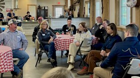 Jed Bower, President of the National Corn and Wheat Growers Association speaks to U.S. Representatives Greg Landsman and Elissa Slotkin at Cherrybend Pheasant Farm