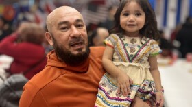 This is the third time Daniel Pacas celebrated Our Lady Guadalupe in New Hampshire. He dressed his daughter Camila with a traditional Indigenous dress from El Salvador, from where they are from. As he looked for a seat in the busy basement of the Transfiguration Church where the congregation had a meal after the Mass, he said he was having "the greatest time."