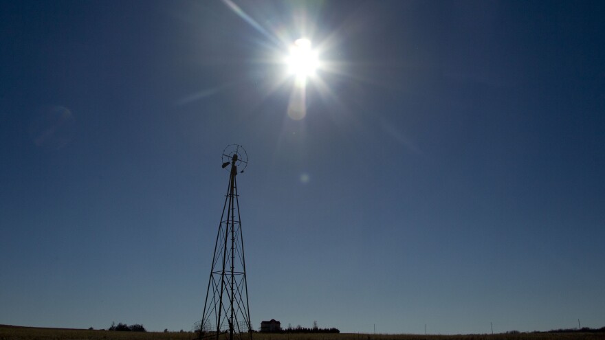 The sun shines above a farm near White City, Kan., in November.