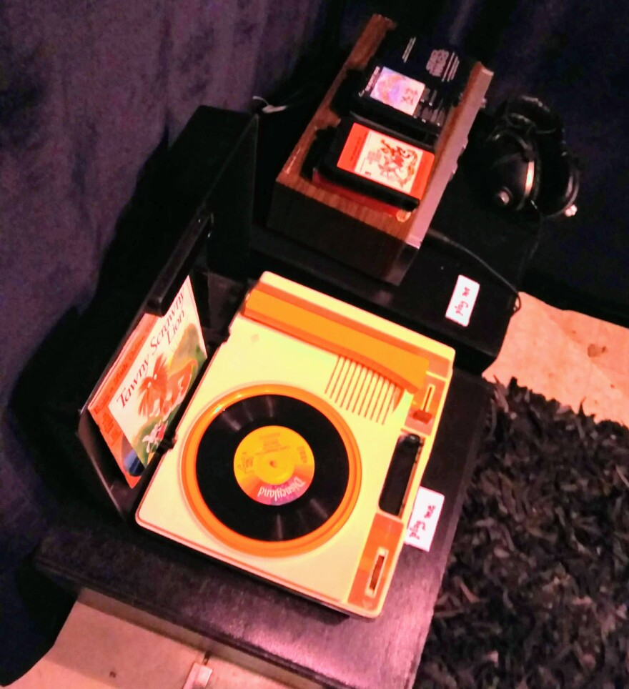 A Fisher-Price record player among many items to play, hear or hold in "Memory in a Void."