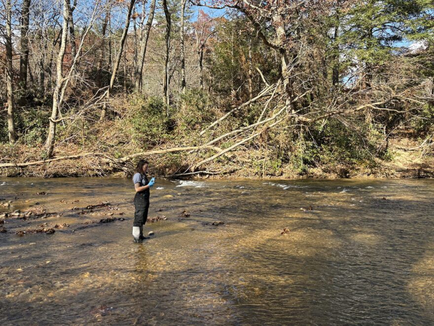 Neuse Riverkeeper Samantha Krop takes a surface water sample.