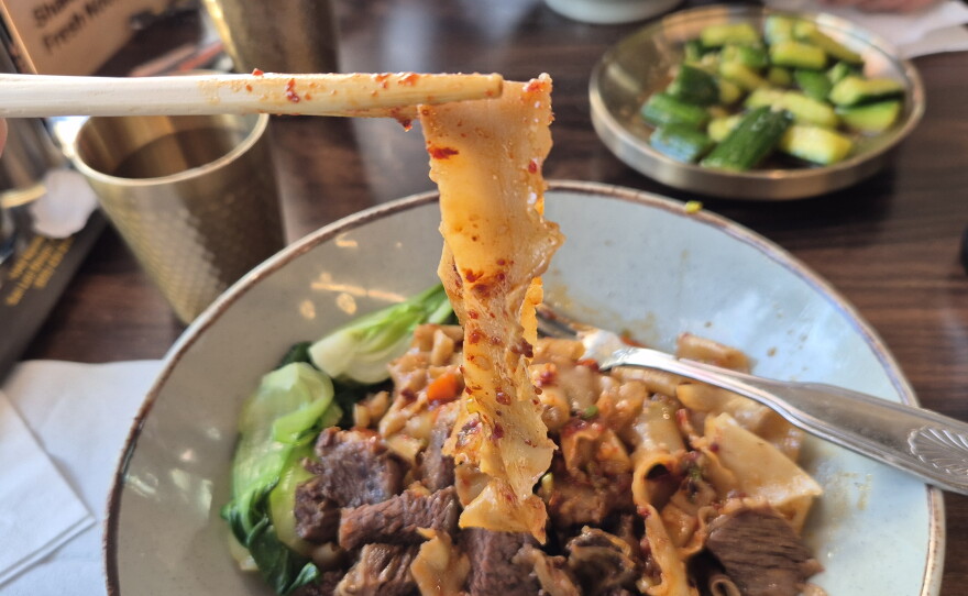 Chili Oil Flat Noodle with Beef Bone