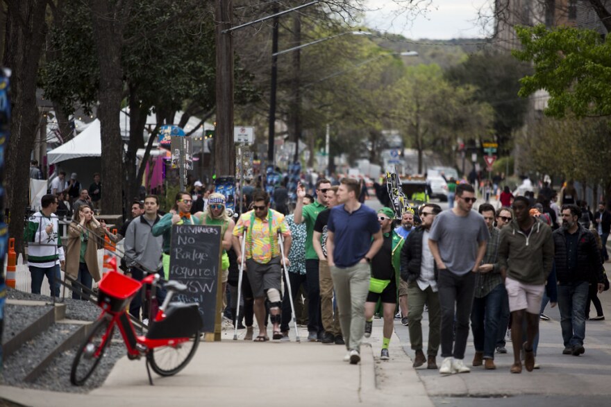 Crowds and scenes from Rainey Street in downtown Austin during South by Southwest Music Festival.