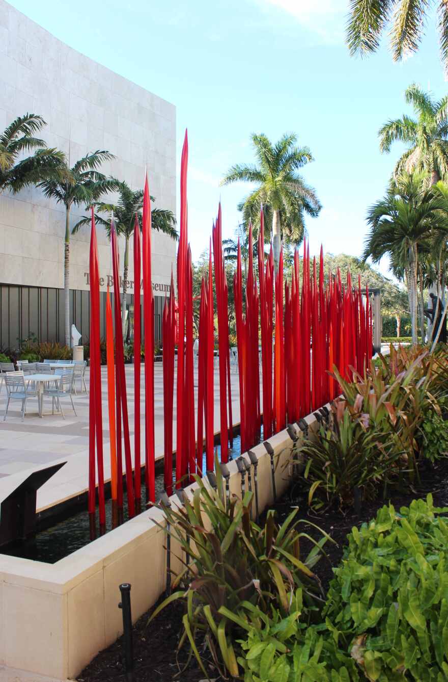 Dale Chihuly 'Red Reeds' in courtyard between Hayes Hall and Baker Museum at Artis-Naples is part of Baker Museum Sculpture Trail.