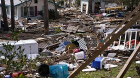 Destruction and debris like furniture around destroyed cottages in the aftermath of Hurricane Helene, in Cedar Key,
