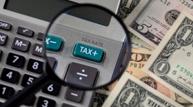 Calculator with a tax button magnified