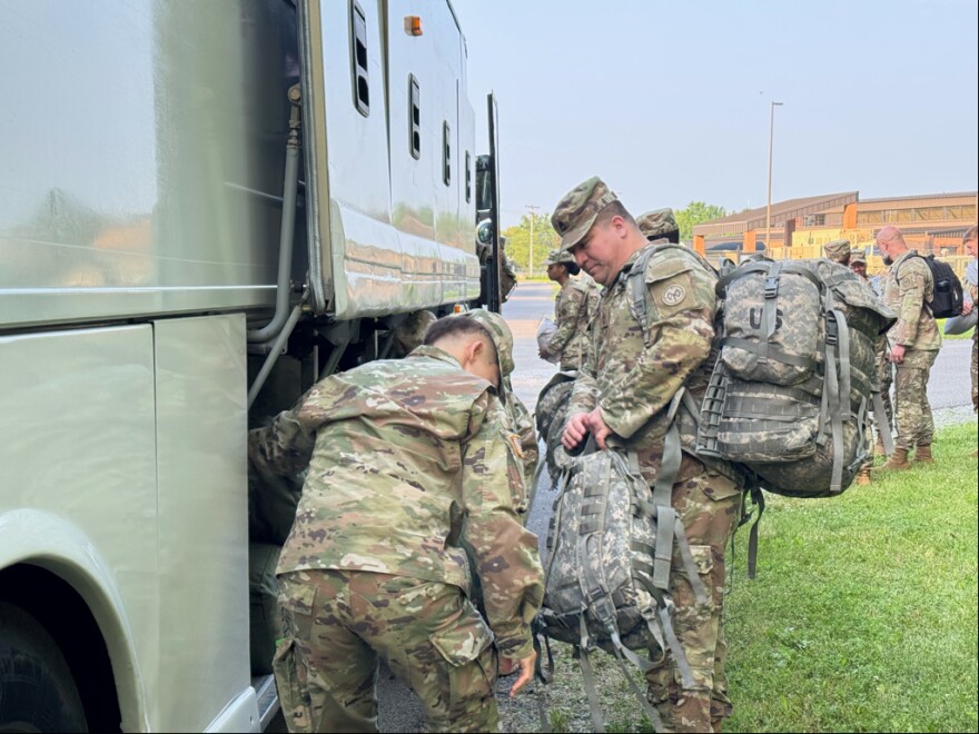 Members of the 27th Infantry Brigade Combat Team, a part of the 42nd Infantry Division, leave Hancock Field Air National Guard Base, to march in the Army Anniversary Parade in Washington, D.C. 