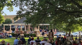 Candidates Jered Taylor and Terry Bible took turns addressing the crowd on the Ozark courthouse lawn during a forum put on by the Christian County Headliner News.