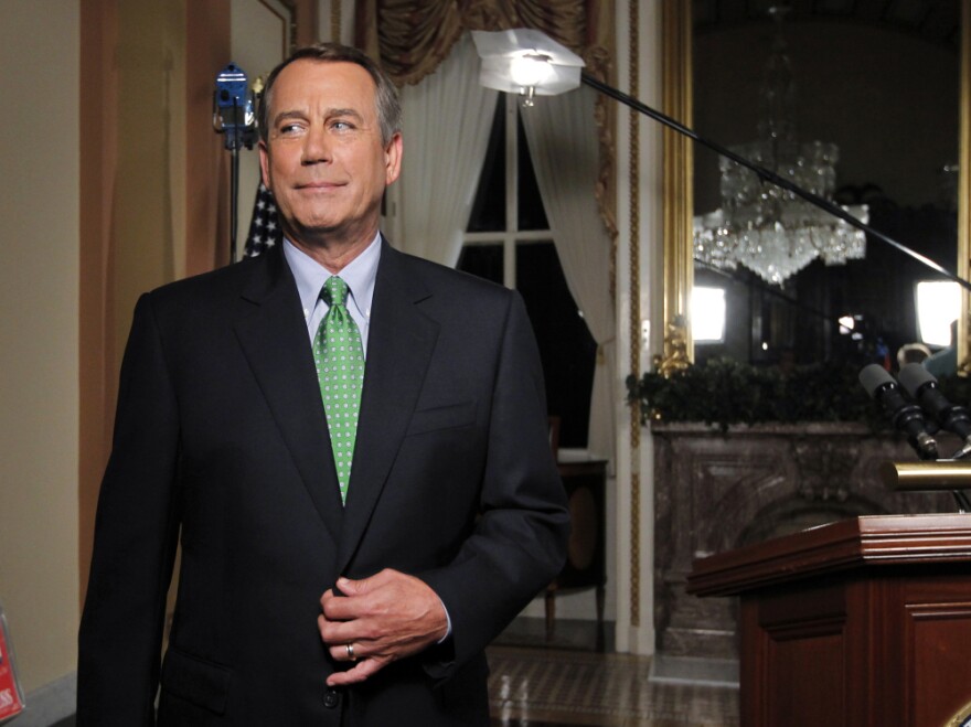 Speaker of the House John Boehner is seen after delivering his response to President Obama's remarks about averting default and dealing with the federal deficit, at the Capitol in Washington, Monday, July 25, 2011.