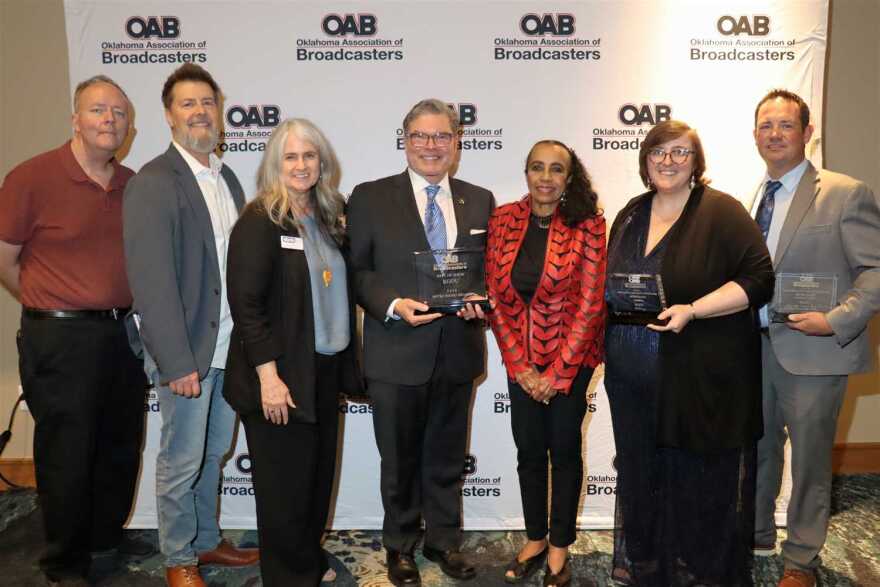 Left to right: Chief Engineer Patrick Roberts, Program Director Jim Johnson, Development Director Jolly Brown, General Manager Dick Pryor, Senior Associate Vice President for University Outreach Dr. Belinda Biscoe, Membership Director Cate Howell, Managing Editor Logan Layden at the OAB Awards.