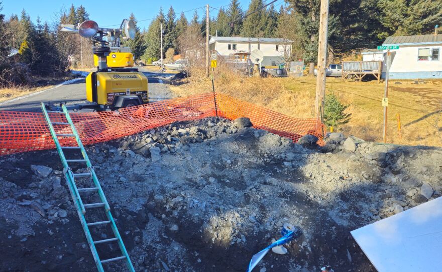 ANTHC staff work with local hires to dig up and replace specific water lines and water mains around Port Lions.