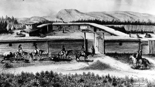 A black and white image of Fort Bridger with men riding horses in front of its walls