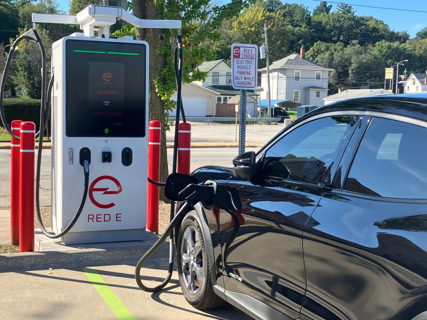 A battery-powered electric car charges at one of two new charging stations at the East Moline Public Library parking lot, Thursday, Sept. 24, 2026.