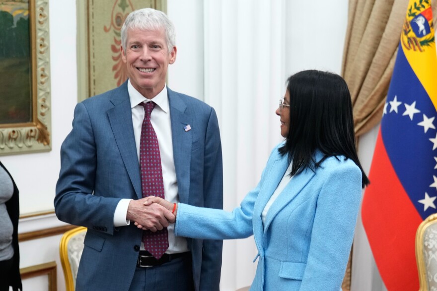 Venezuelan acting President Delcy Rodriguez greets U.S. Energy Secretary Chris Wright at Miraflores presidential palace in Caracas, Venezuela, Wednesday, Feb. 11, 2026. (AP Photo/Ariana Cubillos)
