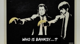 A photo of the "Who is Banksy...?" art piece at "The Art of Banksy" exhibit in Magic City Studios.  