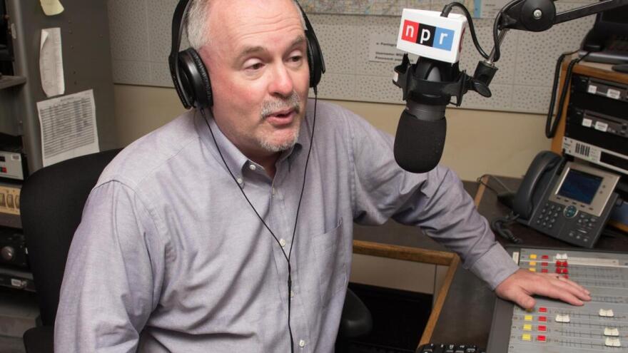 Norton broadcasting from WGLT's previous studios in Old Union on Illinois State University's campus. The station moved to the north end of campus, in the Vidette Building, in 2024.