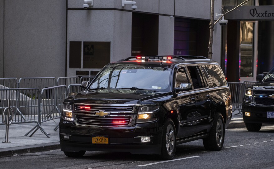 Former President Donald Trump's motorcade exits Trump Tower on Tuesday.