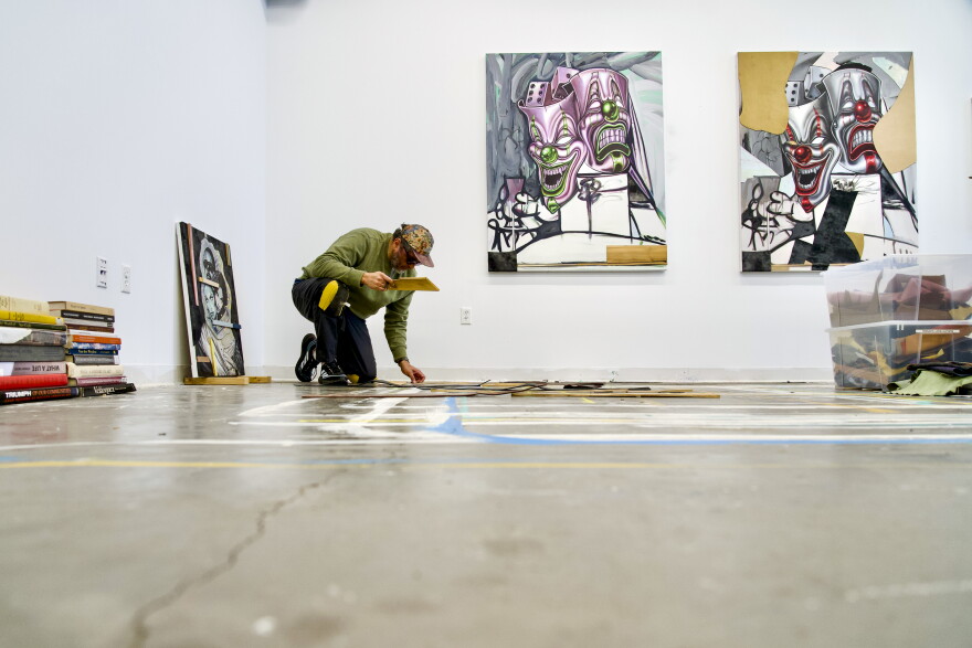 Artist Edgar Serrano works in his studio at NXTHVN.