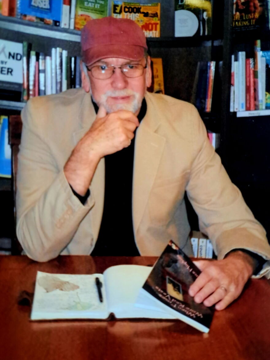 Bruce Hopkins signing books at Prairie Lights Books in Iowa City.